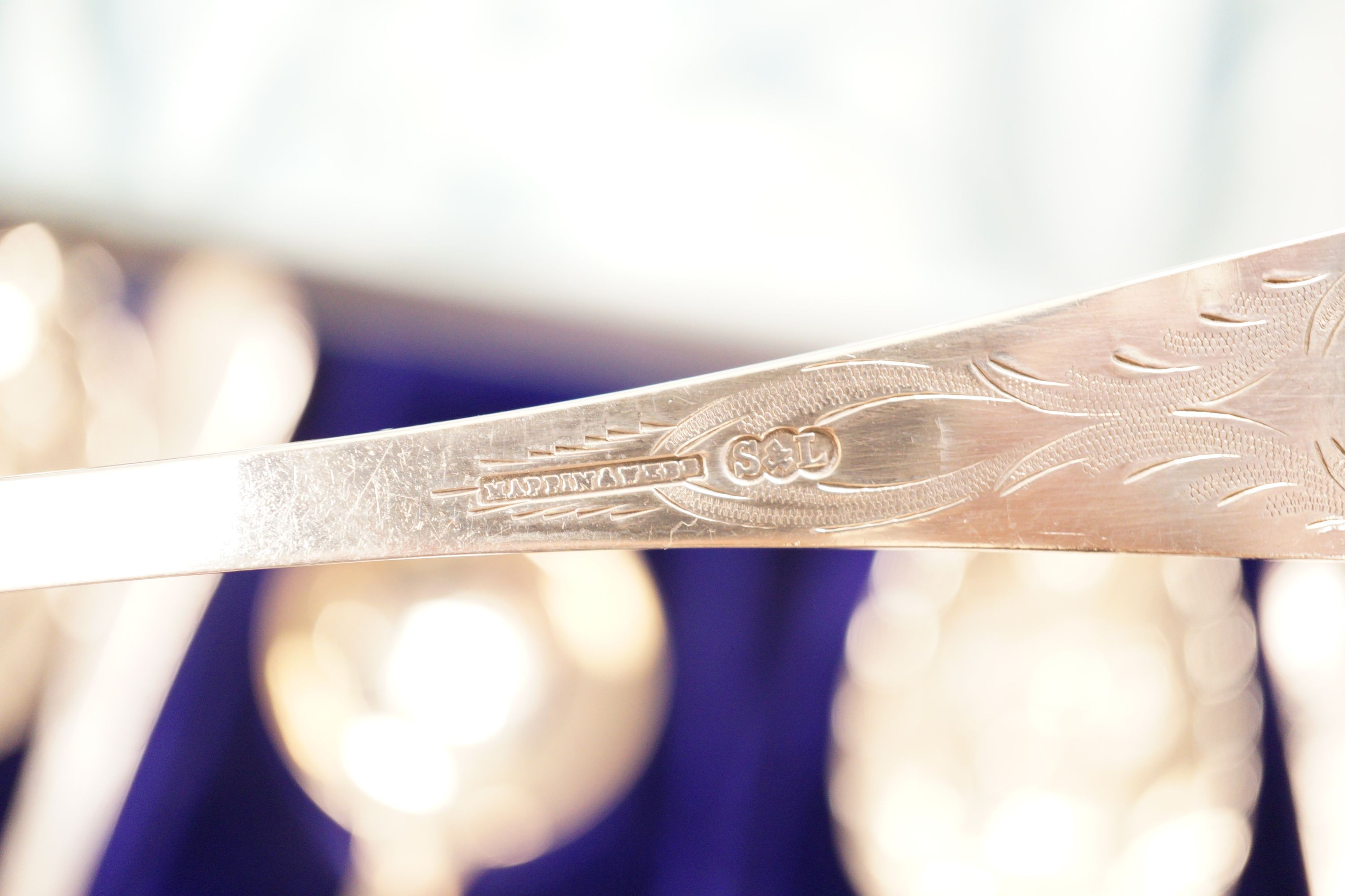 A cased set of Mappin & Webb plated berry spoons